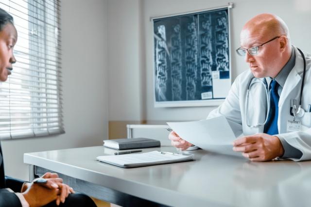 Doctors discussing pediatric neurological infection