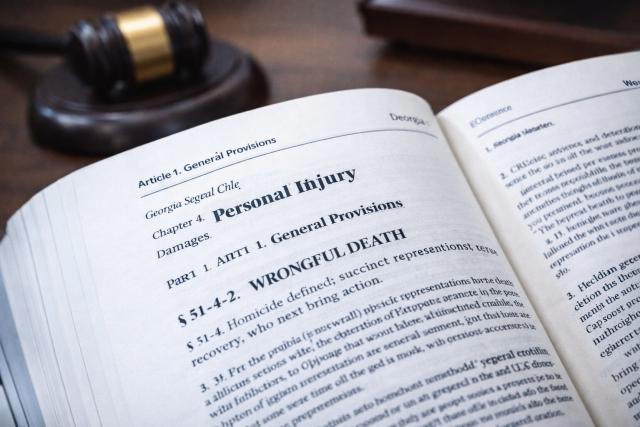 Close-up of Georgia legal code book open to wrongful death statutes